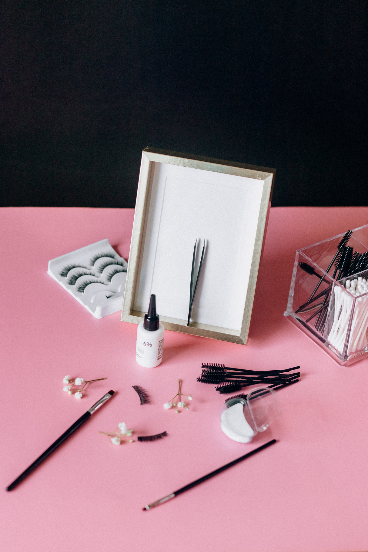 Black and Silver Scissors on Pink Table